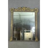 Overmantel mirror, 19th century carved and painted with Rococo gilt gesso decoration. H.178 W.211cm.