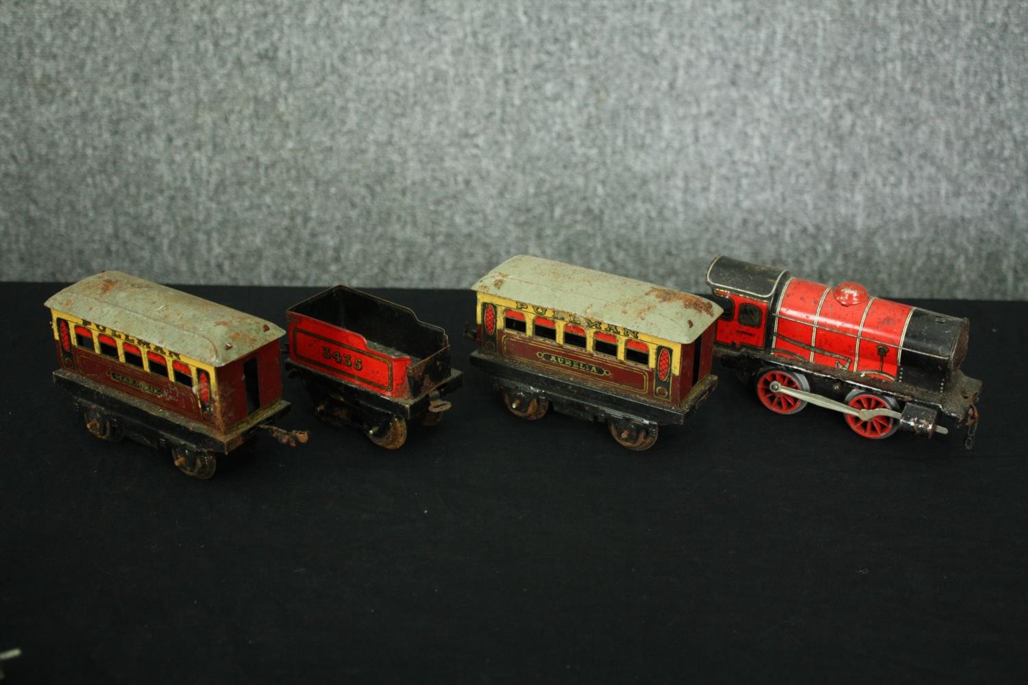 A collection of tin plate cars and trains along with track. L.33cm. (largest). - Image 2 of 13