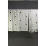 A pair of fully lined white abstract block pattern cotton mix curtains. L.230 W.225cm. (each).