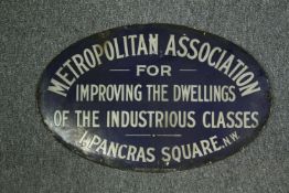A 19th century enamel building plaque. H.38 W.61cm.