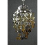 A contemporary gold and silver sheet metal flower waterfall ceiling lamp. H.72 Dia.60cm.