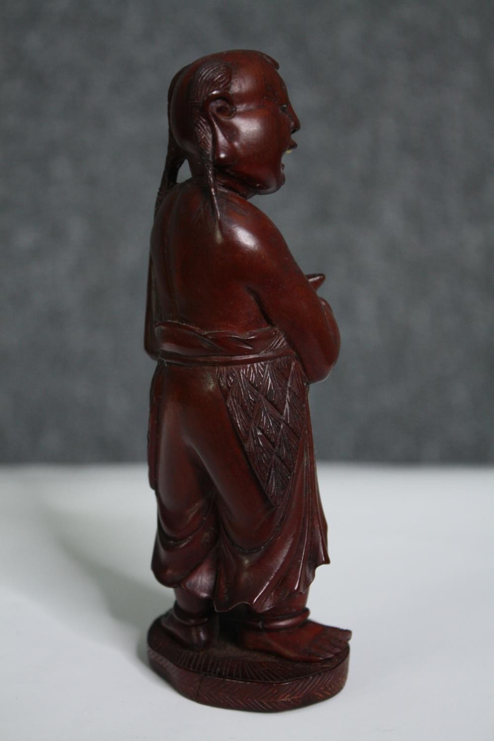 Two Eastern figures, one ceramic the other carved hardwood. H.15cm. (largest). - Image 8 of 10