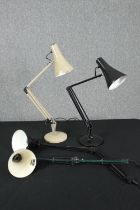 Four vintage anglepoise lamps, two missing their bases. H.90cm. (largest).