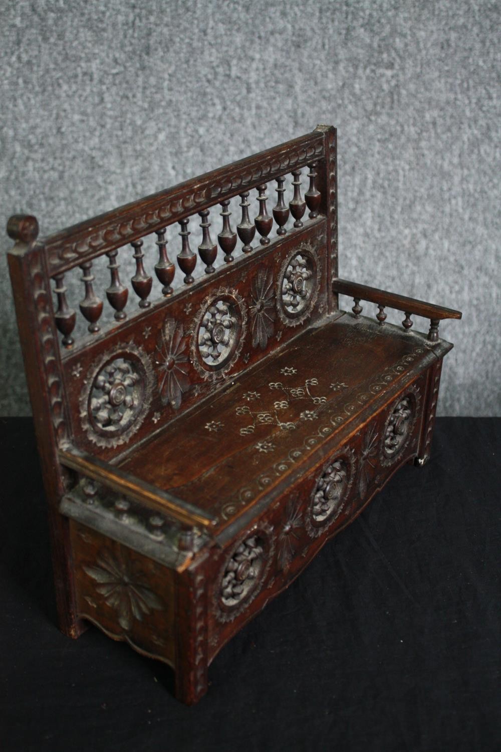 A C.1900 Breton miniature bench with lift up seat. H.25 W.32cm. - Image 2 of 5