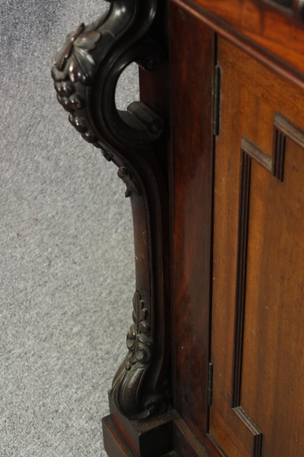 Sideboard, 19th century mahogany with central panelled doors flanked by fruit carved pilasters on - Image 9 of 9