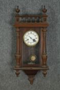 A 19th century mahogany cased Vienna regulator wall clock with eight day movement. H.76 W.34 D.17cm.