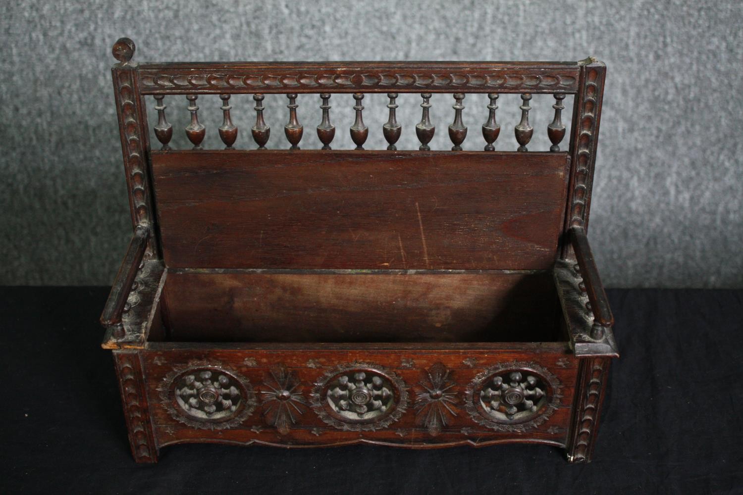 A C.1900 Breton miniature bench with lift up seat. H.25 W.32cm. - Image 4 of 5