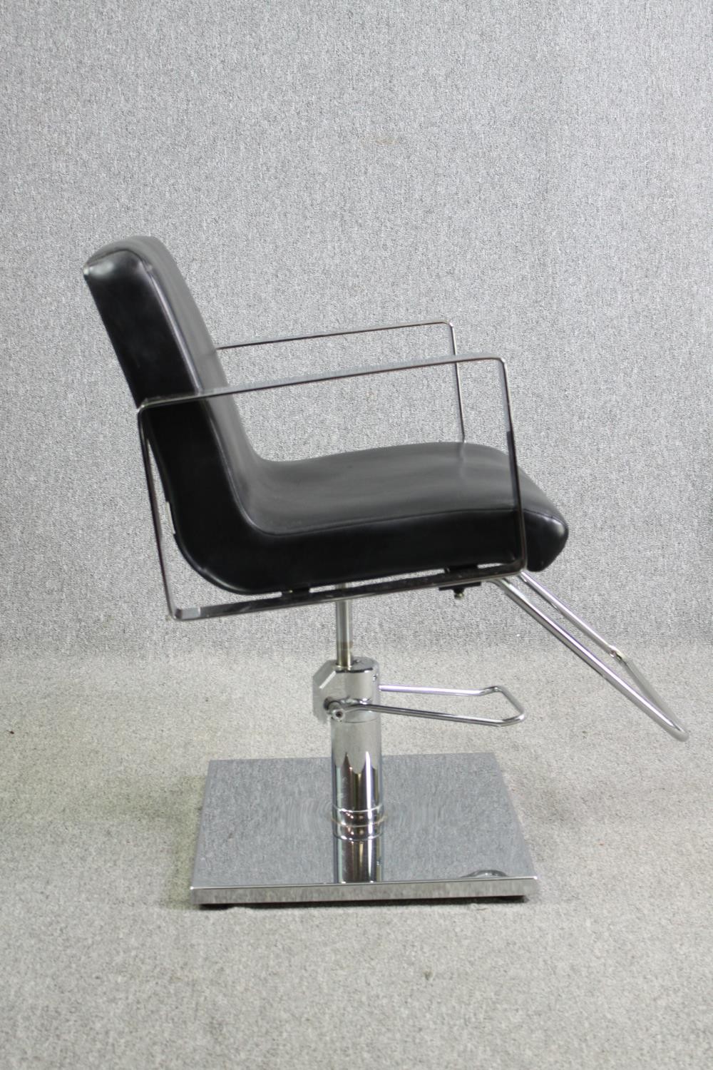 A pair of adjustable chrome barber's chairs in faux leather upholstery. - Image 4 of 6