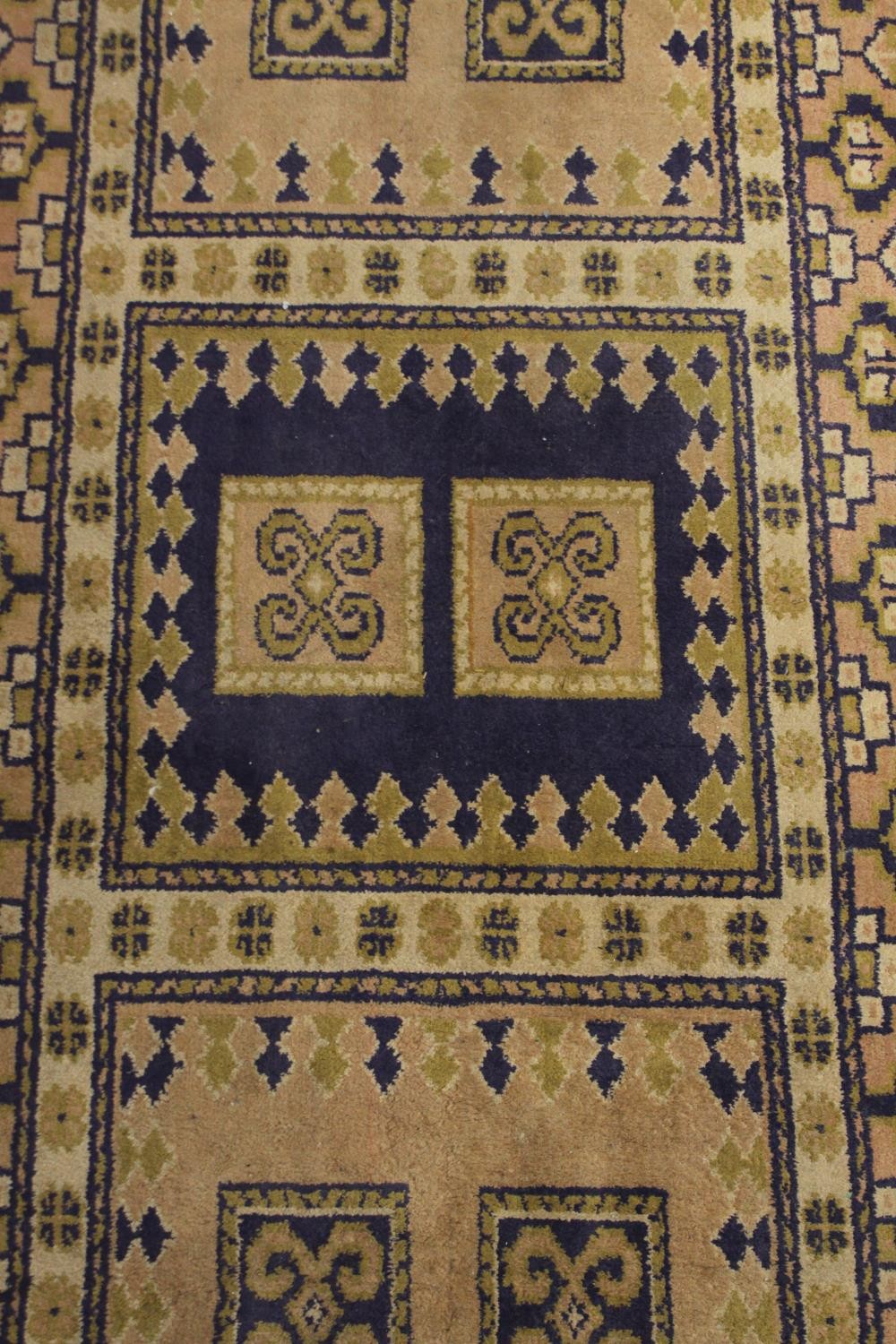 An Eastern runner with geometric design within multiple borders. L.330 W.92cm. - Image 2 of 4