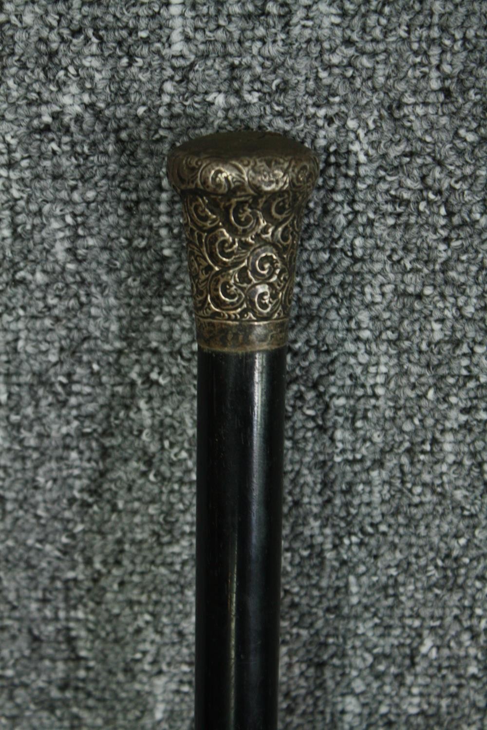 Two walking canes, one with a hallmarked silver handle. L.90cm. (largest) - Image 2 of 7