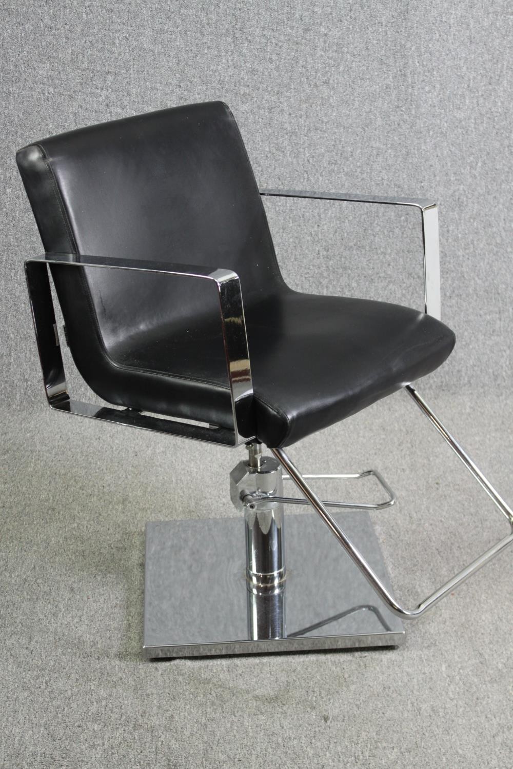A pair of adjustable chrome barber's chairs in faux leather upholstery. - Image 3 of 6