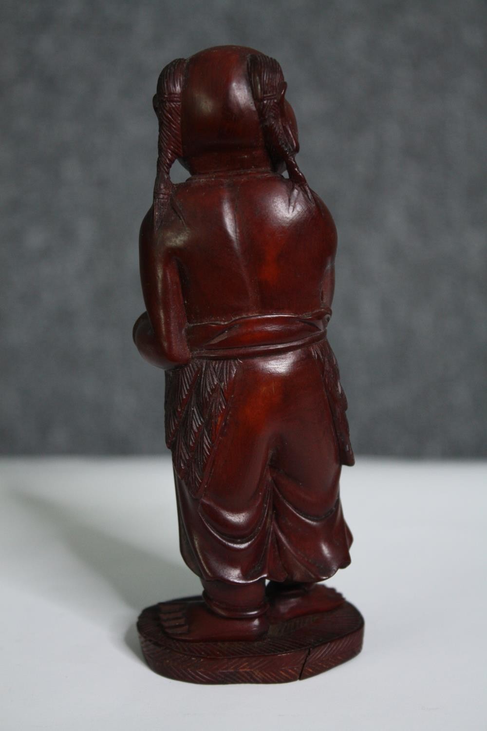 Two Eastern figures, one ceramic the other carved hardwood. H.15cm. (largest). - Image 9 of 10