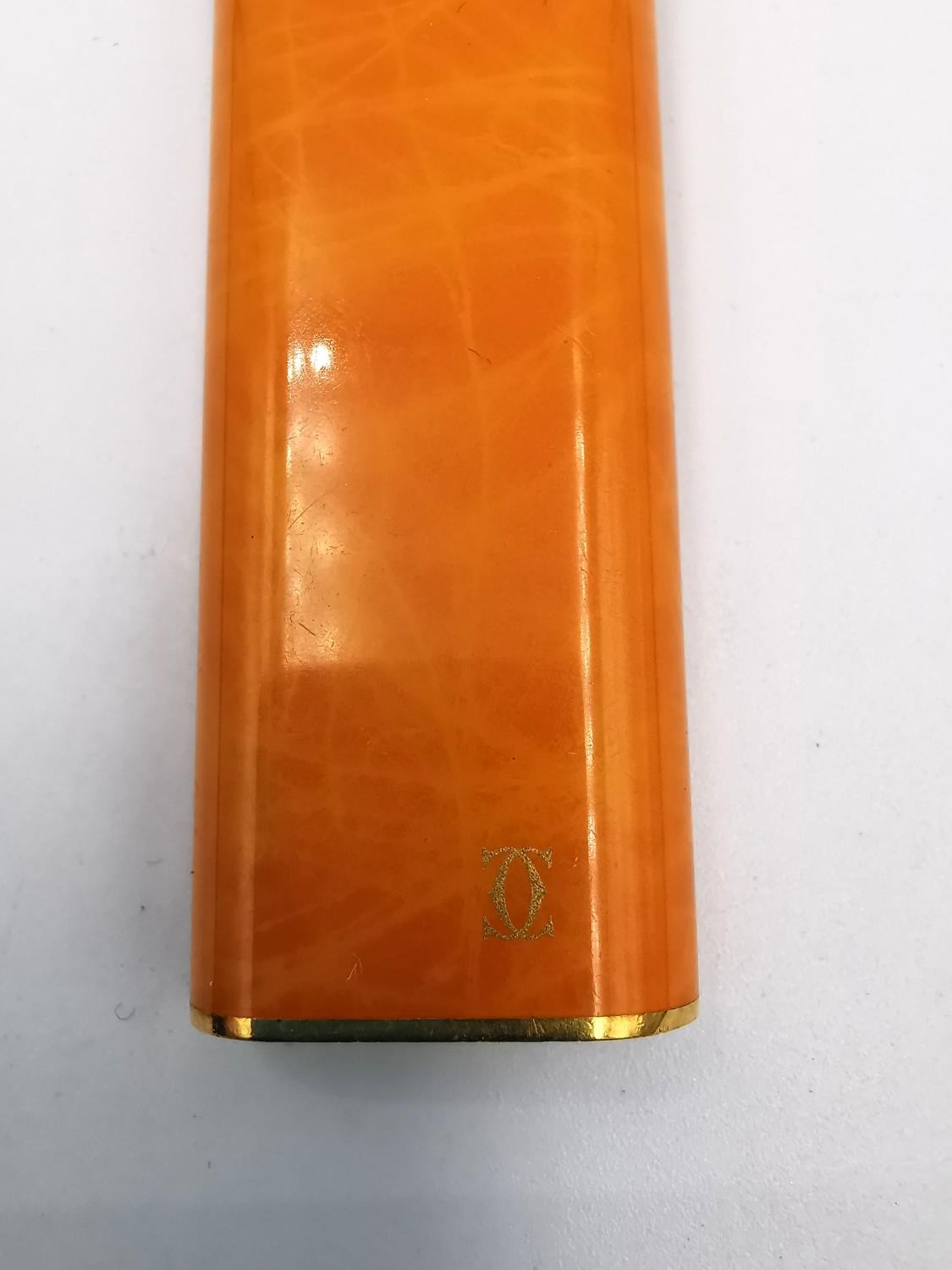 Cartier Must de Cartier lighter with three colour gold plated bands and orange marbled finish. - Image 4 of 7