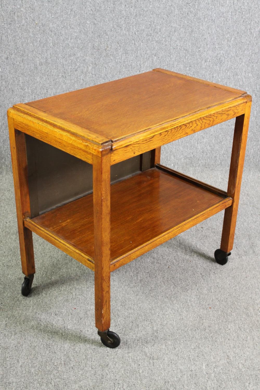 A mid century light oak serving or drinks trolley with spring action drop side. H.66 W.80 D.64cm. - Image 4 of 7