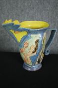 An art pottery jug, signed and dated. H.24cm.