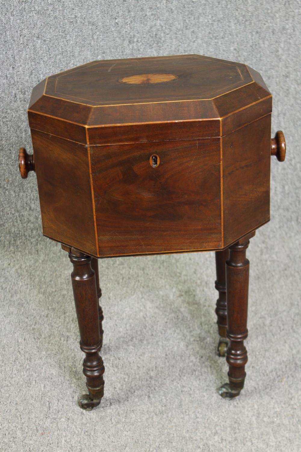 A Georgian mahogany and satinwood inlaid cellarette, fitted interior with lift out zinc liners. H.65