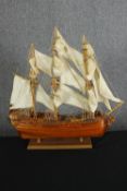 A scratch built model of a galleon. H.61 W.63 D.13cm.