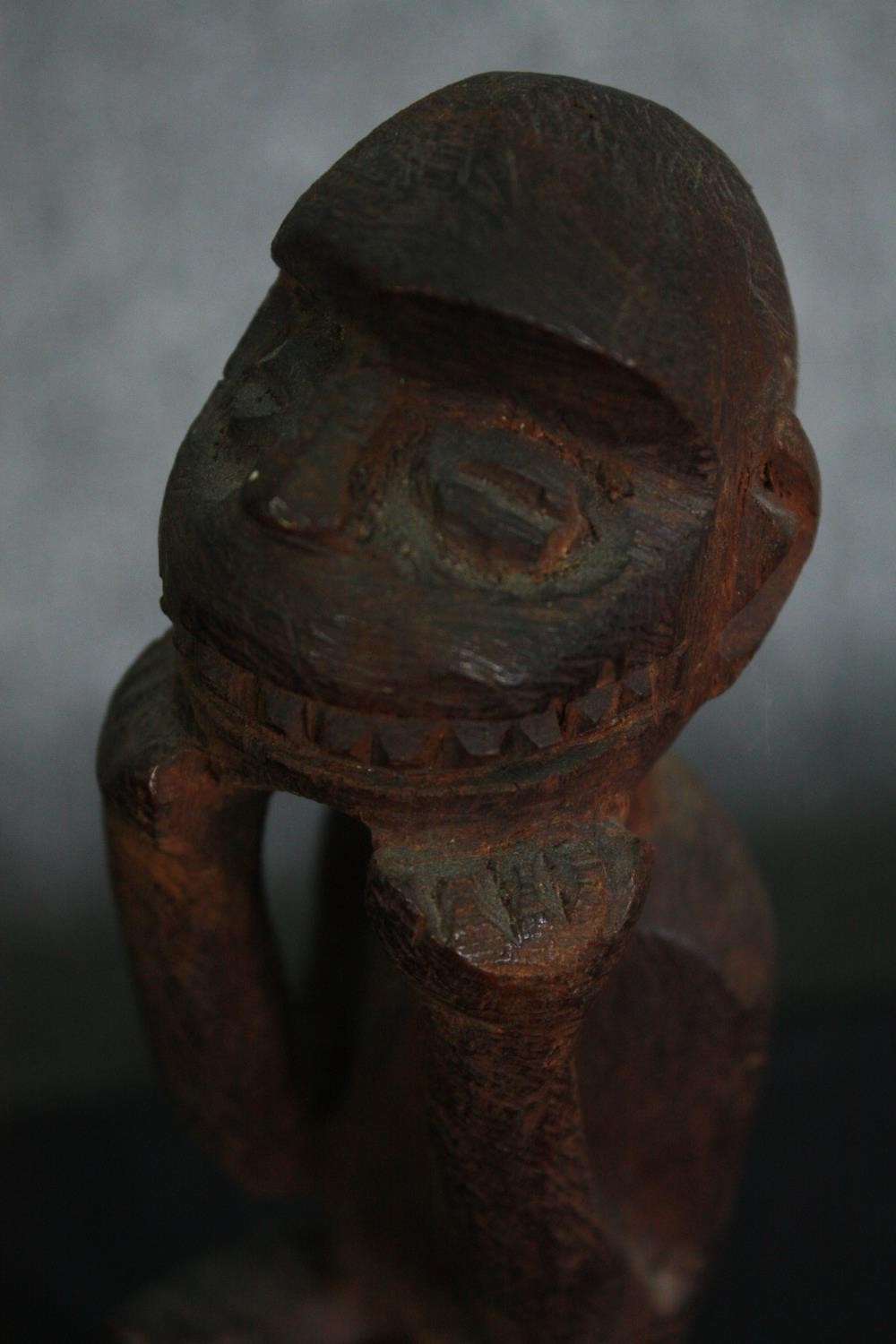 A carved Eastern hardwood figure of a goddess, an African carving and a central American carved - Image 11 of 15