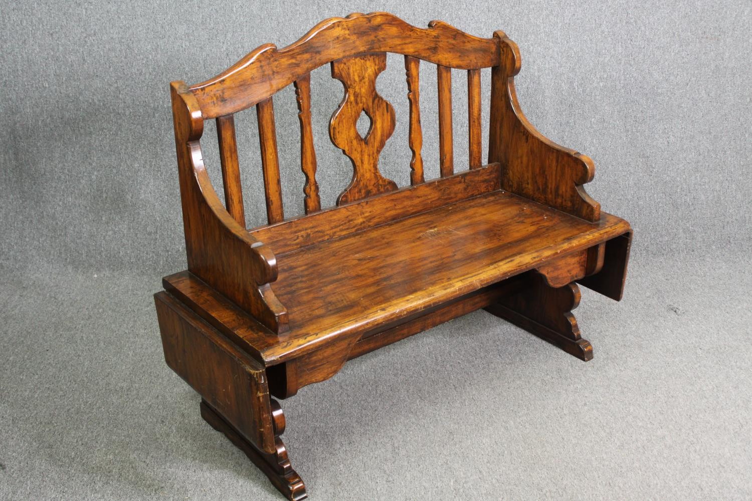 A Continental walnut bench with (unusual) drop flaps to each end. H.105 W.107 D.51cm. - Image 2 of 7