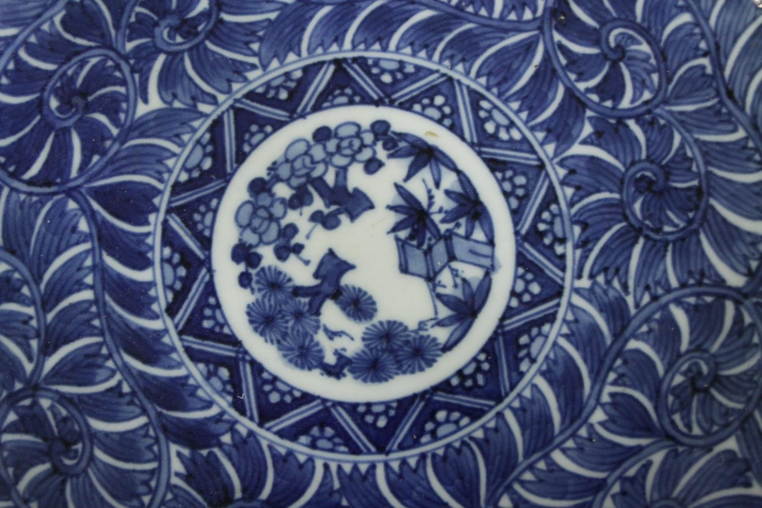 A set of early 20th century Chinese blue and white hand painted dishes with stylised floral and - Image 3 of 5