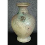 A large oriental peach and turquoise crackle glaze vase with signature to base, raised handles. H.