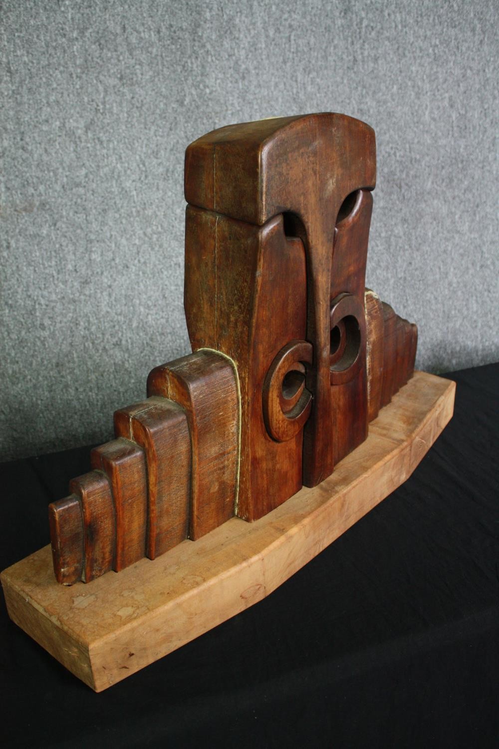 A carved hardwood abstract figure group. H.54 W.80 D.21cm. - Image 4 of 7