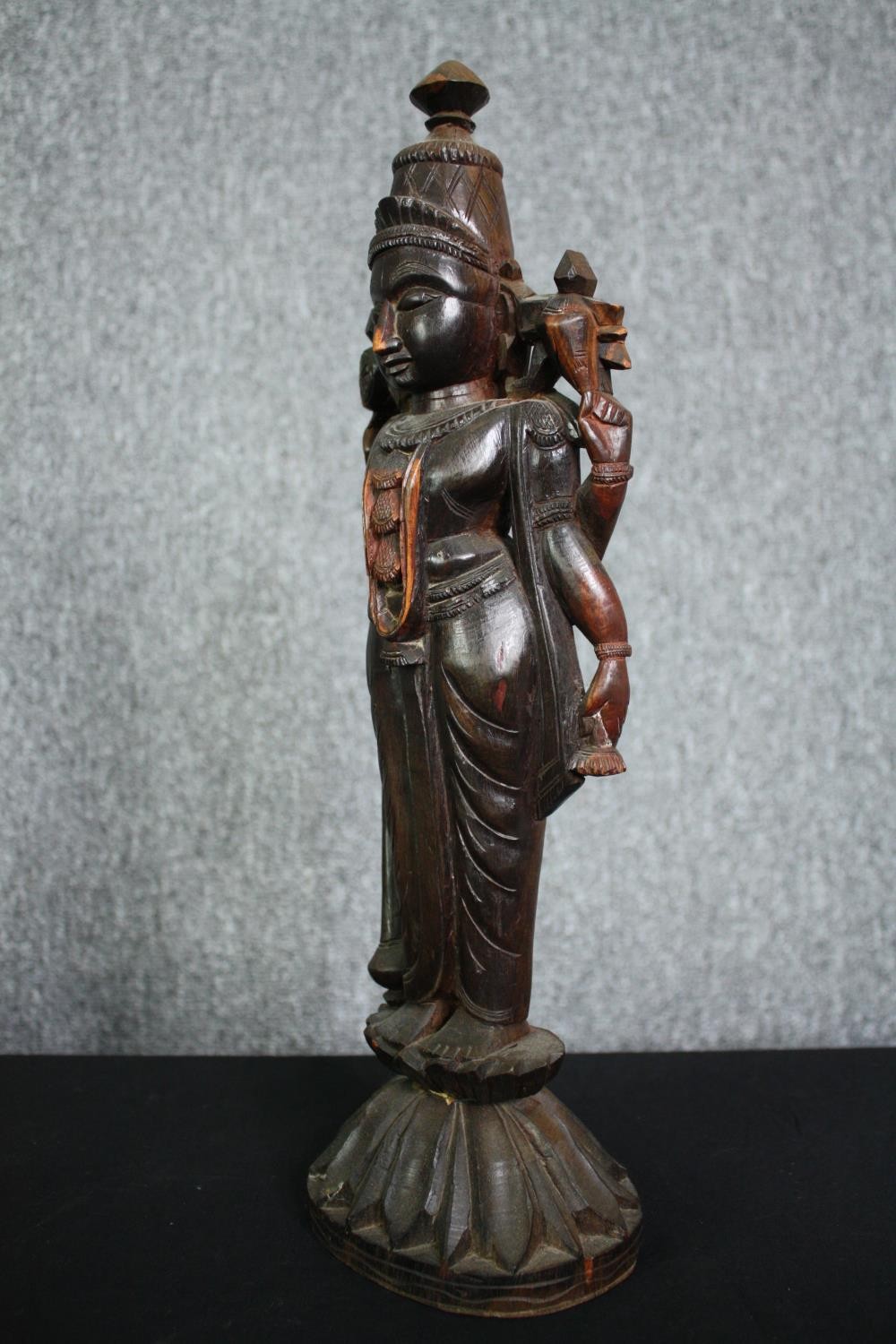 A carved Eastern hardwood figure of a goddess, an African carving and a central American carved - Image 12 of 15