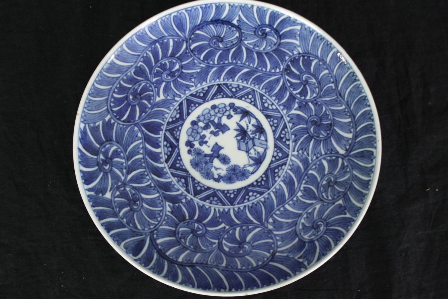 A set of early 20th century Chinese blue and white hand painted dishes with stylised floral and - Image 2 of 5