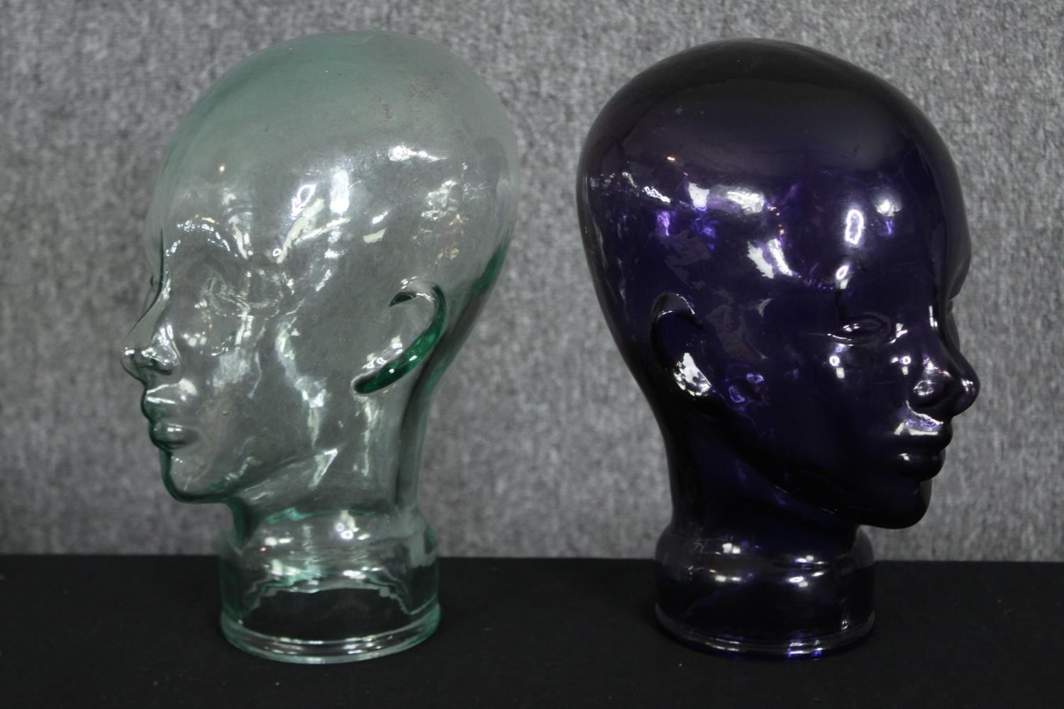 Two 20th century glass milliners mannequin pressed glass heads having moulded features, one dark - Image 3 of 5