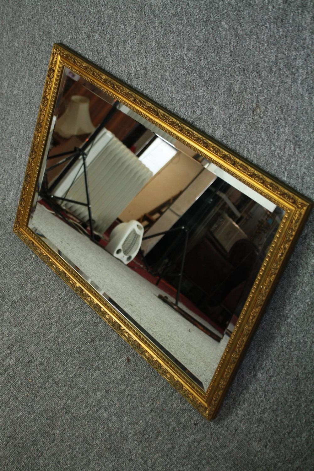 A contemporary gilt framed wall mirror. H.54 W.75cm. - Image 3 of 5