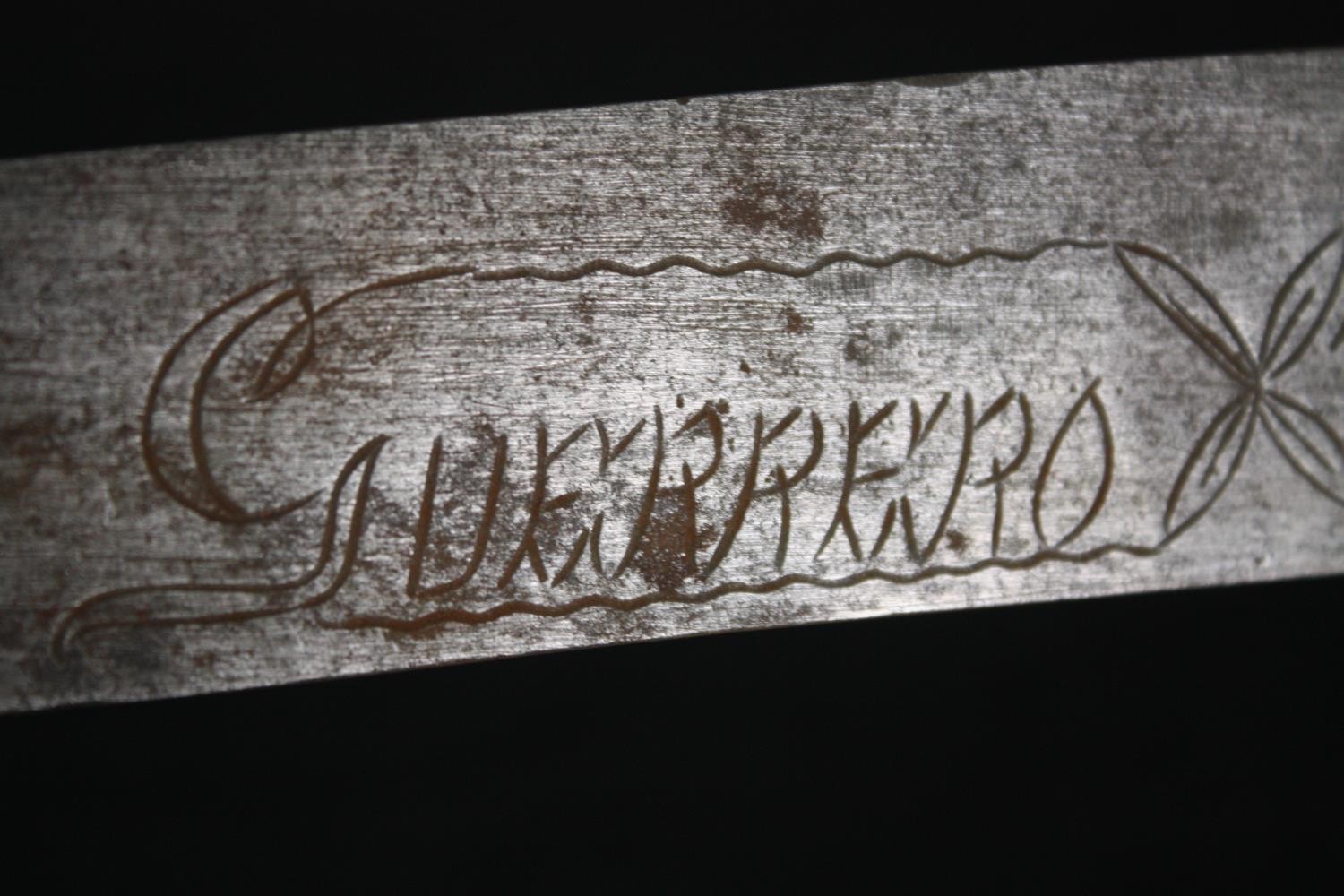 A sword with engraved blade in stitched leather scabbard, possibly a central American saddle - Image 9 of 10