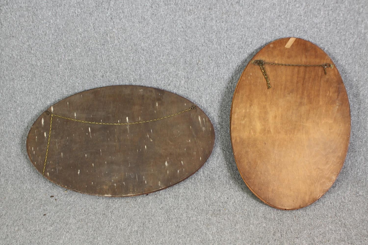 Two oval mirrors, one in oak, the other walnut, with bevelled glass H.95 W.55cm. - Image 8 of 8