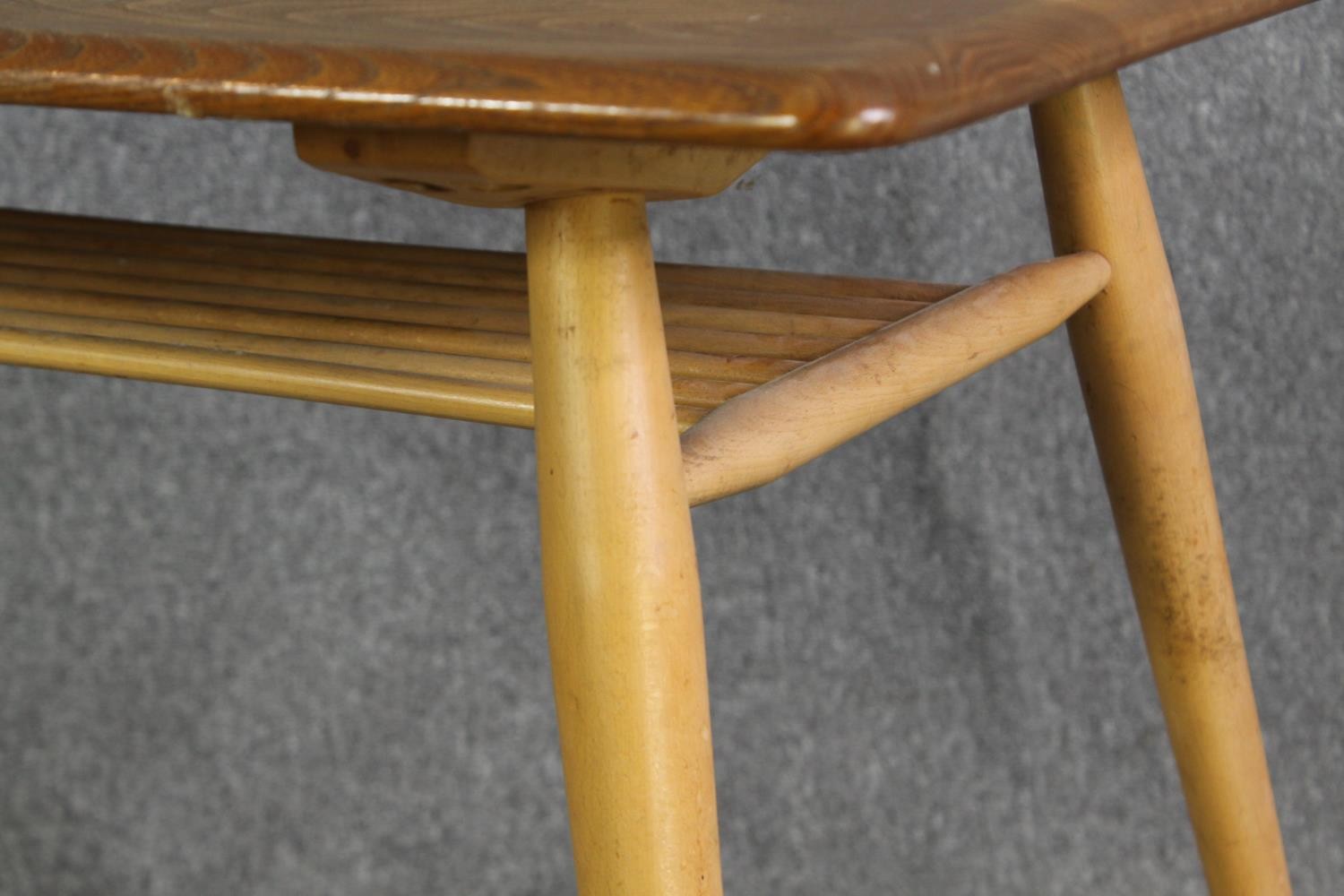 An Ercol light elm side table, with an undertier on beech supports. H.74 W.98 D.68cm. - Image 4 of 6
