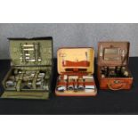 Three vintage mid 20th century travelling dressing table sets, H.8 W.30 D.19cm. (largest).