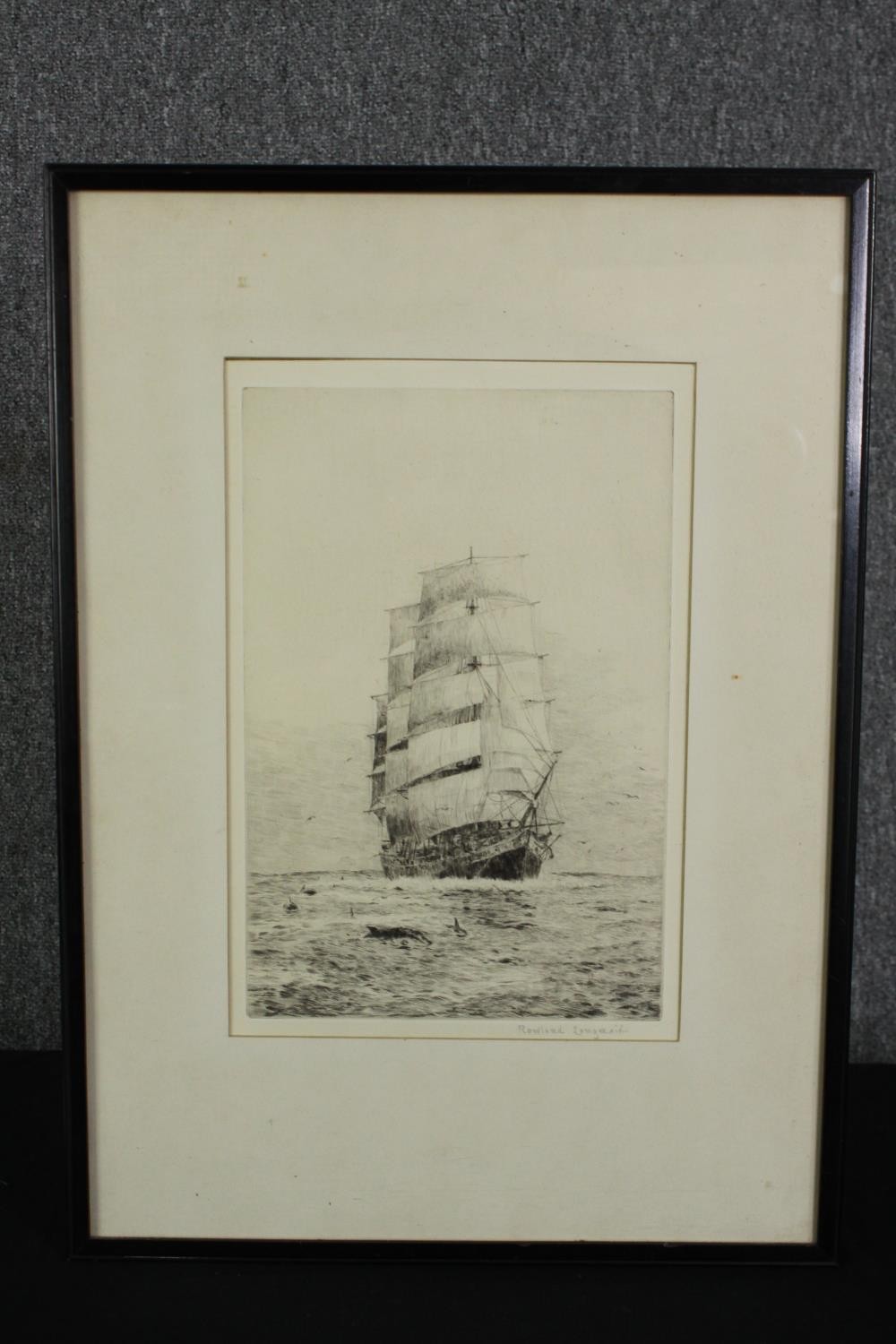 A signed framed and glazed etching of a clipper in full sail, by Rowland Langmaid. H.53 W.38cm. - Image 2 of 4
