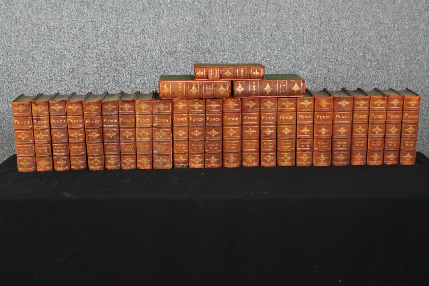 The History of Punch, late 19th century, volumes 1-100, complete set, leather bound. H.29 W.24cm. (