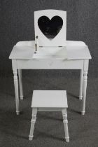 A white painted child's desk and stool. H.68 W.75 D.40cm. (largest).