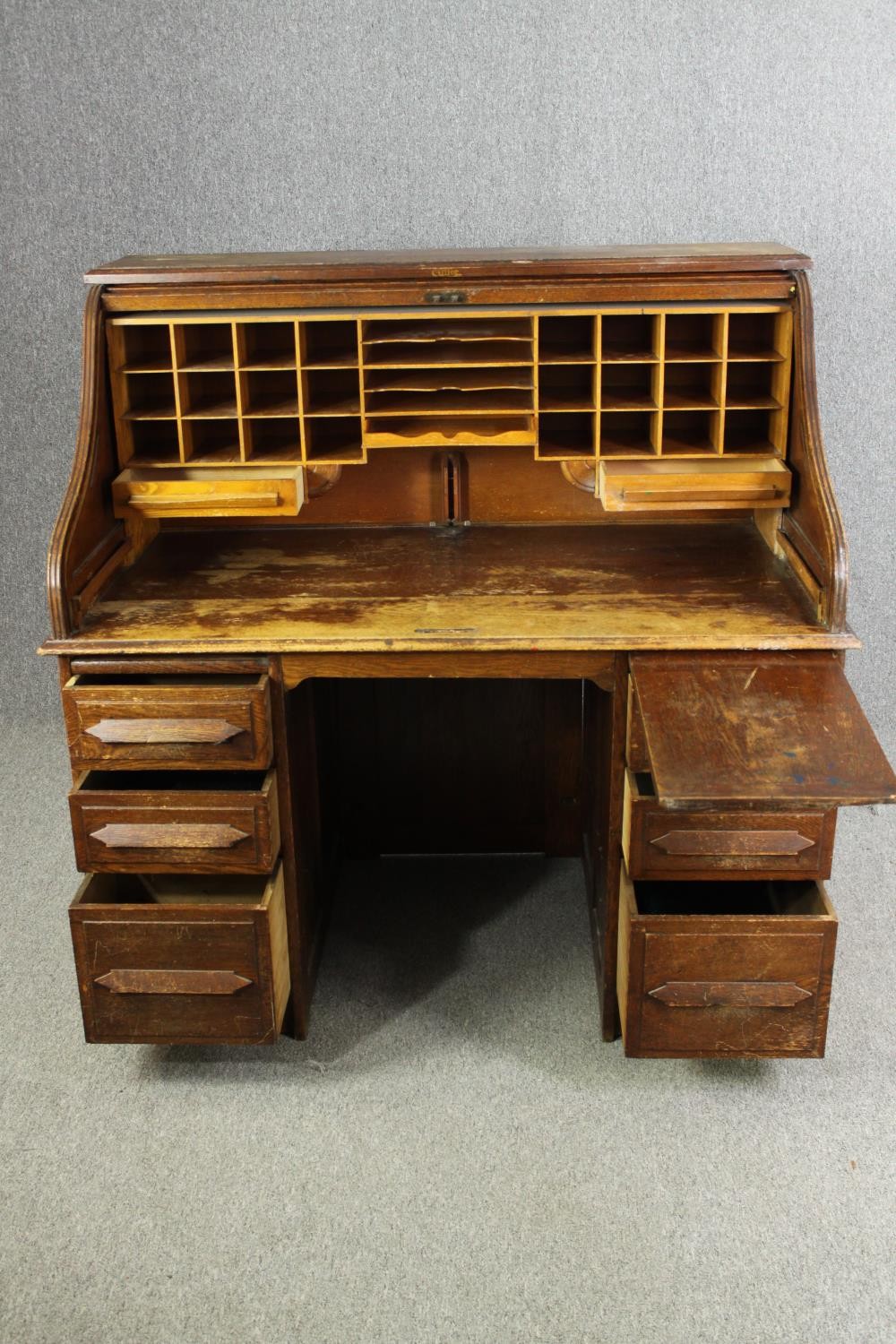 An oak roll top tambour fronted desk, early 20th century with maker's mark. H.128 W.126 D.76cm. - Image 8 of 8