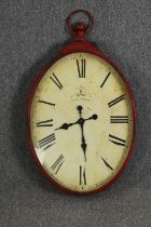 A vintage cafe style painted metal wall clock, H.85 W.57cm.