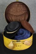 A vintage dressing box, with various vintage hats. H.46 W.47 D.24cm. (box)