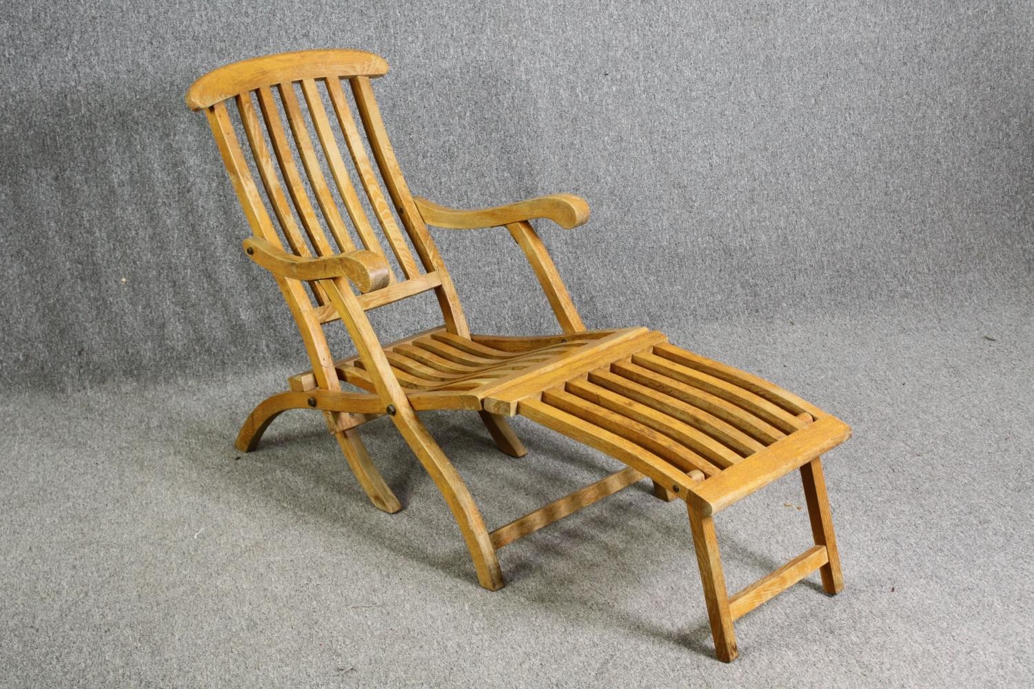 An oak folding steamer chair, first quarter 20th century, H.87 W.60 D.140cm. - Image 2 of 12