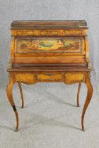 A French Louis XV style kingwood, painted, and gilt metal mounted Bonheur du Jour, late 19th/early