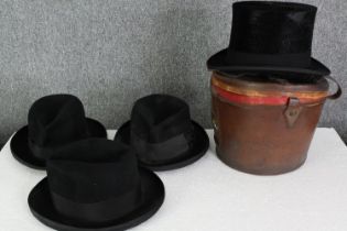 A vintage top hat and box, and three felt fedoras. H.22 W.36 D.27cm. (box).
