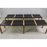 A pair of contemporary Heal's teak and black leather dining benches. H.48 W.200 D.45cm. (each).