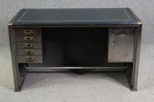 An industrial steel and leather desk by Harvey Milner, H.72 W.121 D.62cm.