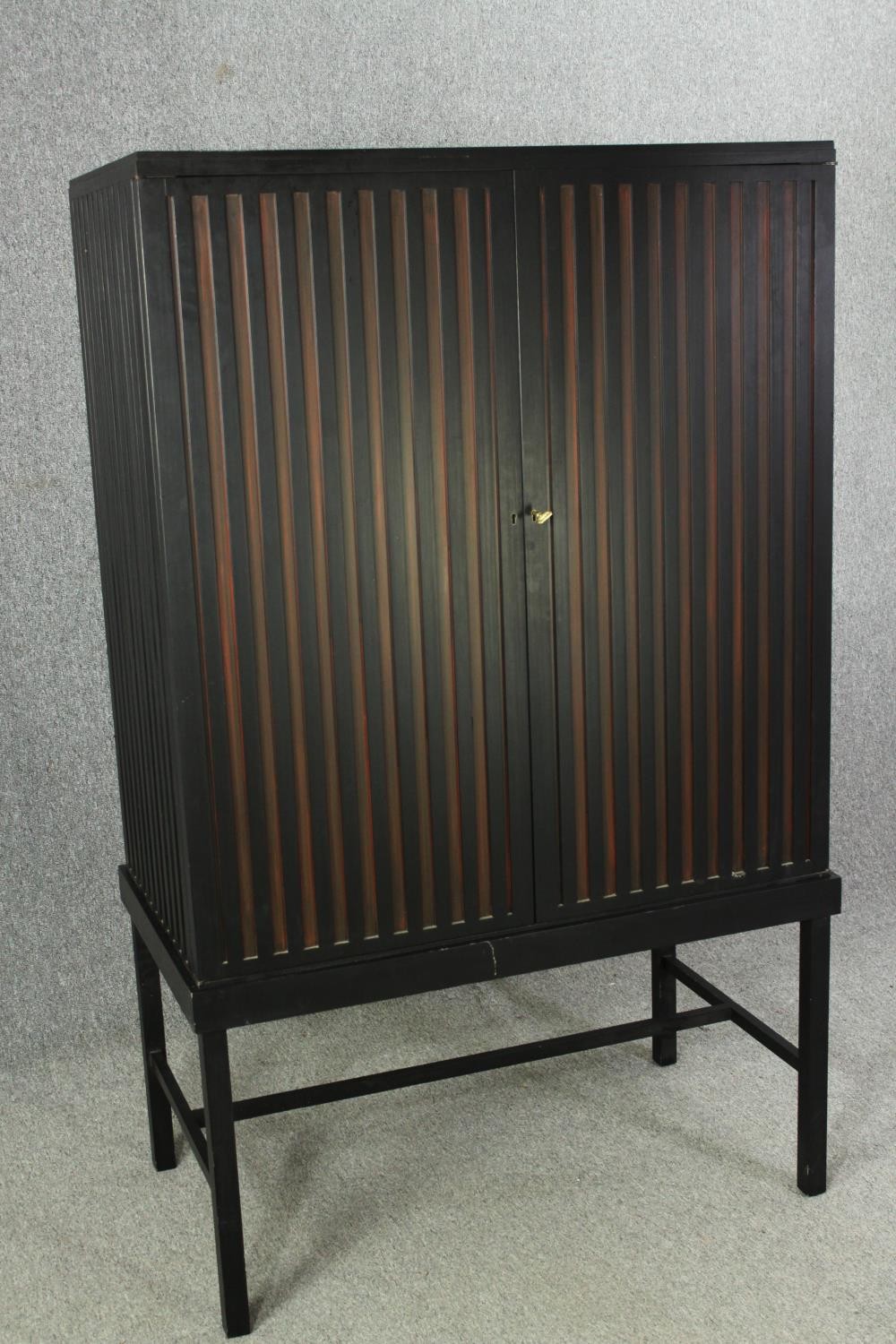 A contemporary ebonized cabinet on stand. H.169 W.102 D.60cm. - Image 2 of 7