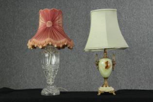 Two table lamp bases, one onyx, the other cut glass, with shades, H.60cm. (largest).