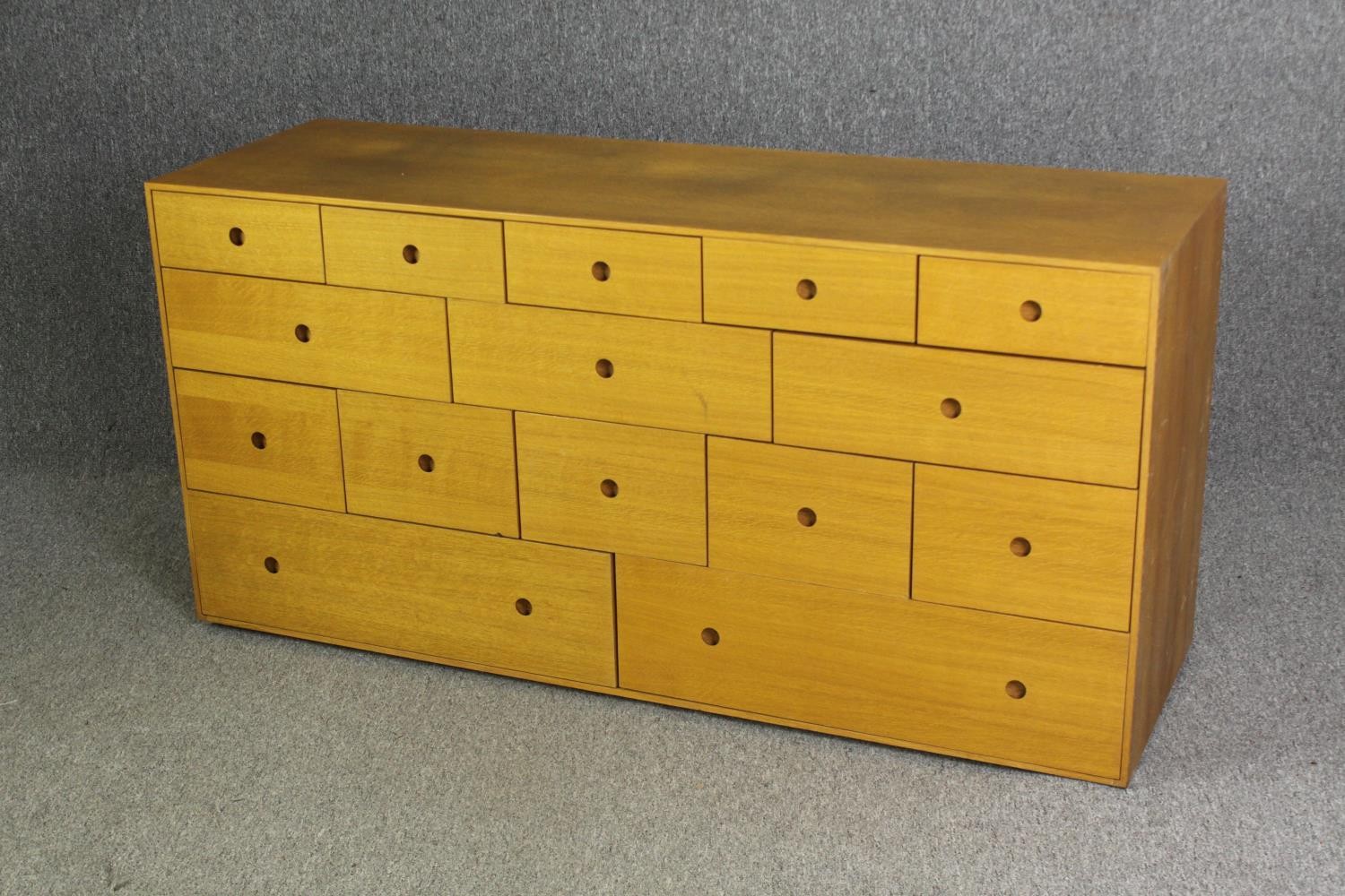 A contemporary light oak chest of drawers, H.73 W.150 D.48cm. - Image 3 of 7