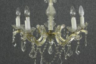 A 20th century five branch chandelier with crystal swags and drops. H.56 Dia.60cm.