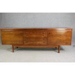 An Archie Shine sideboard with hidden hot plate. H.76 W.213 D.51cm.